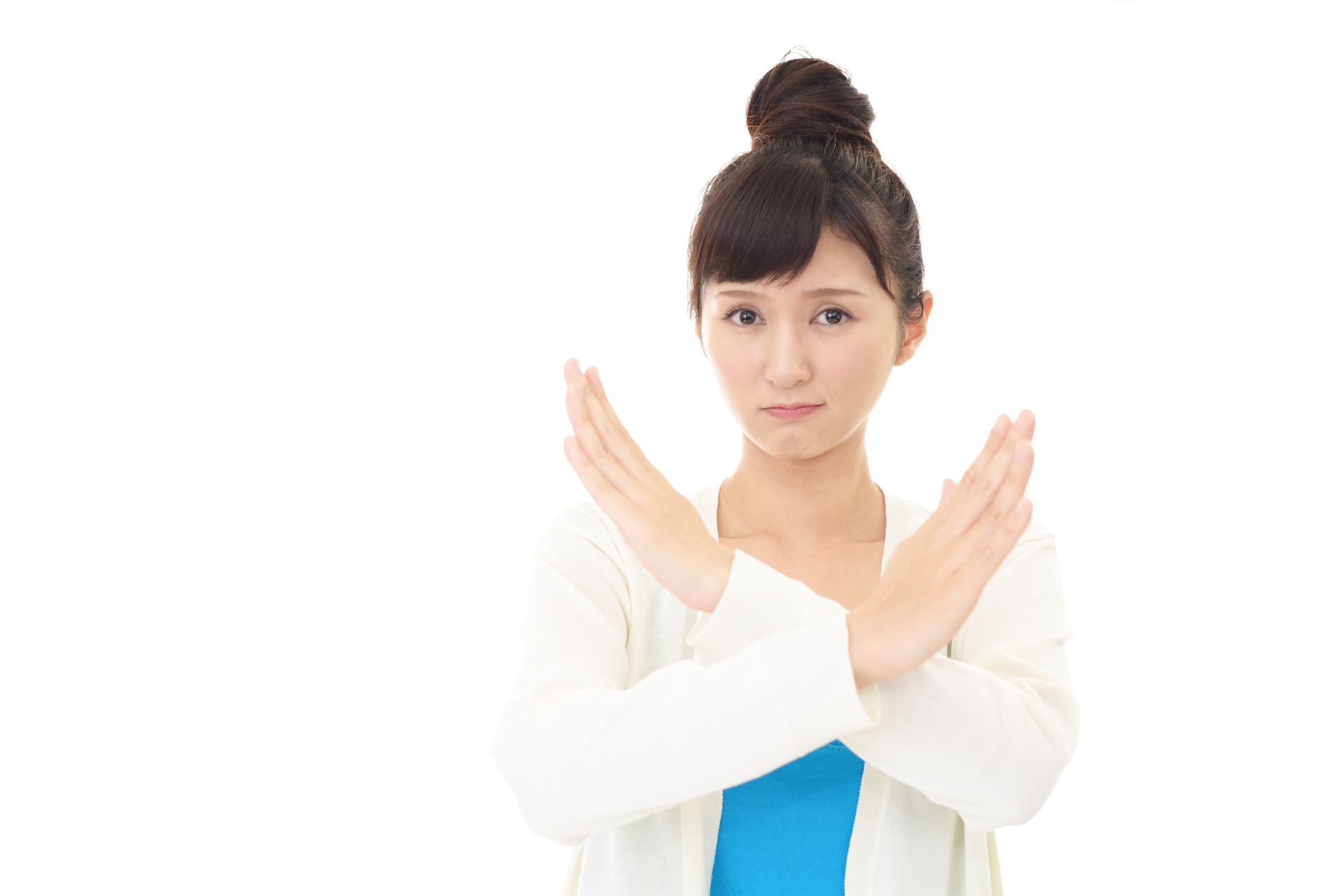 禁止の意思表示をする女性